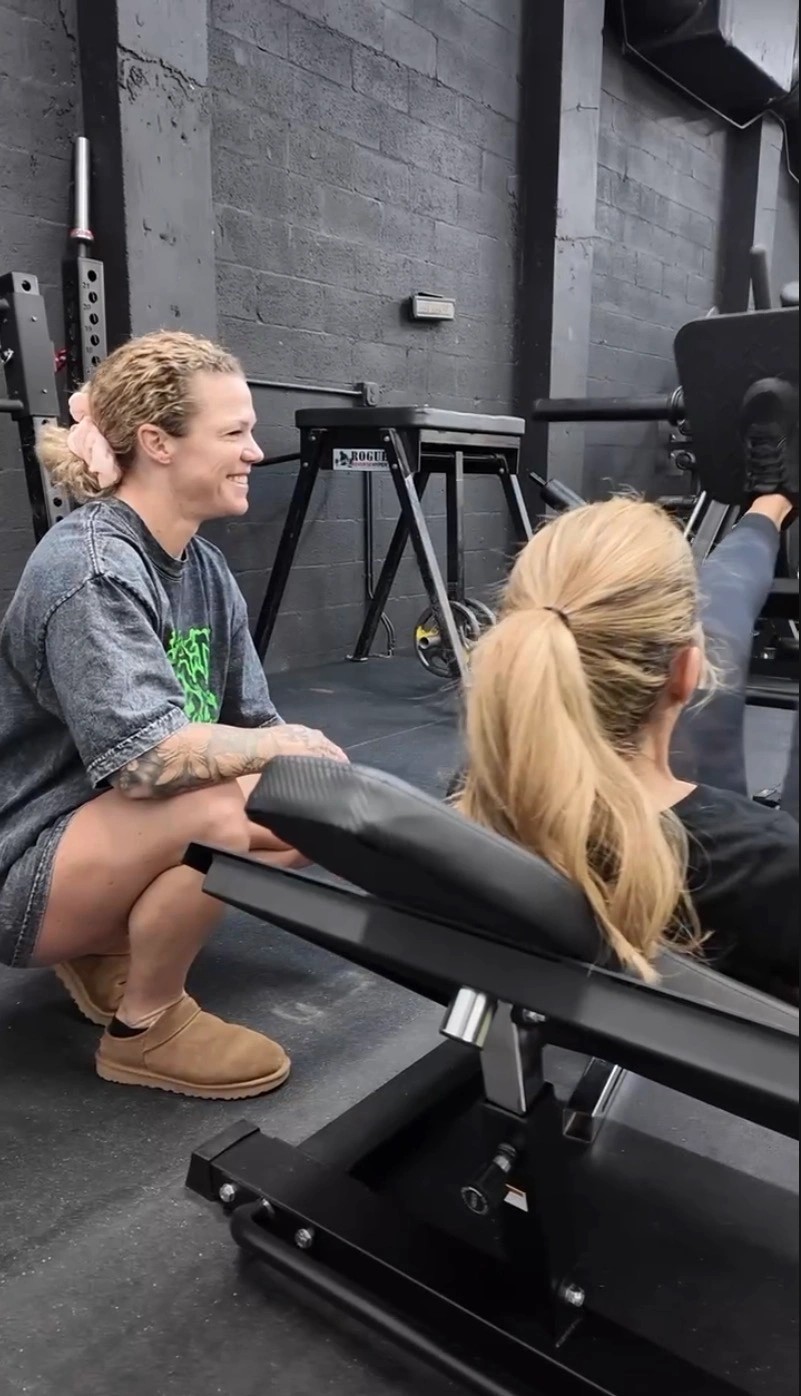 Paige Henry coaching a client one-on-one